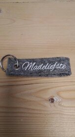 Tas/ sleutelhanger. Madeliefste