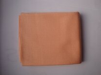 Poppentricot donker huid.