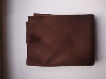 Poppentricot donkerbruin.