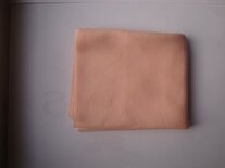 Poppentricot lichte huid.