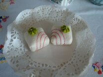 Petit Fourtje ecru/roze