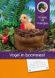 Pakket Vogel in boomnest