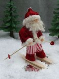 Pakket Kerstman op ski's
