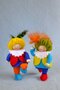 Paqkket Twee pietjes met blanke kralen